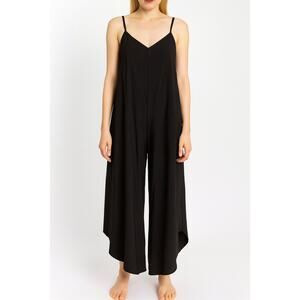 WASHED WOVEN SLOUCHY FITTED JUMPSUIT WITH CAMI STRAP. MADE IN USA